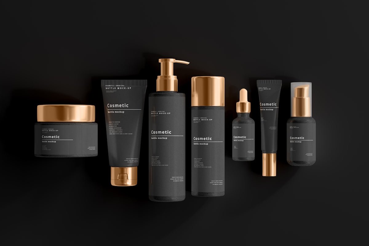 a group of black and gold products on a black background