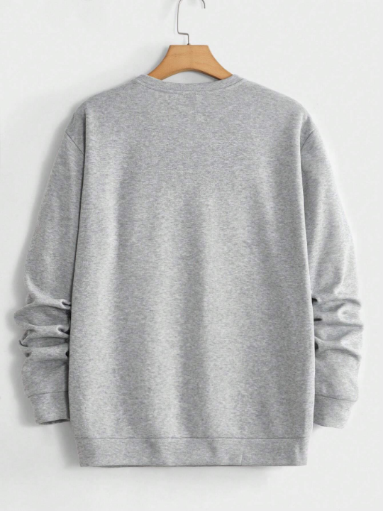 Manfinity Unisex Men Letter Graphic Sweatshirt