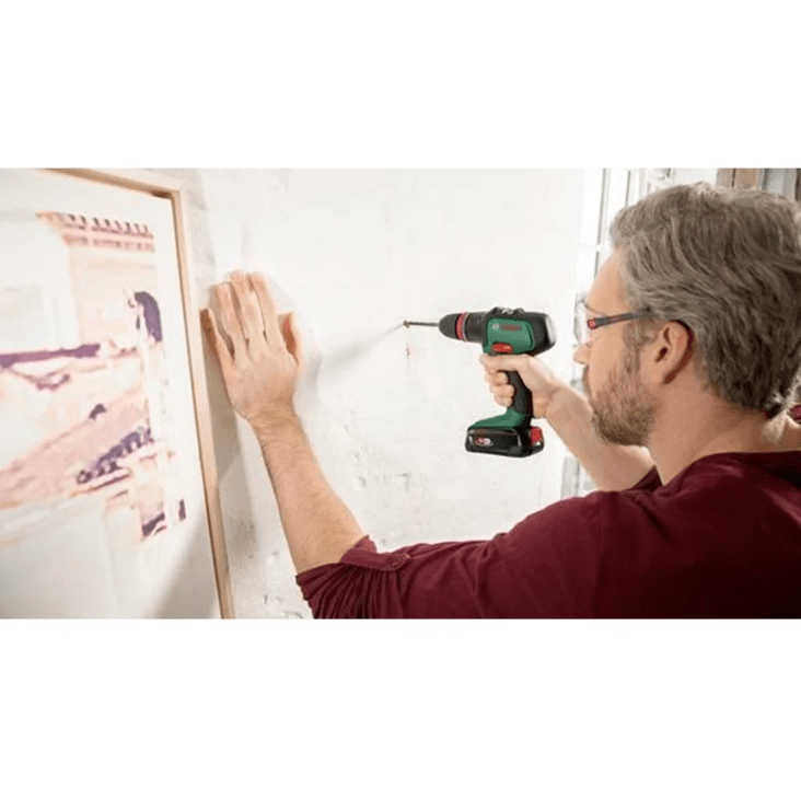 Bosch AdvancedImpact 18 cordless two - speed hammer drill: 2x battery charger accessories - Lolli World Marketplace