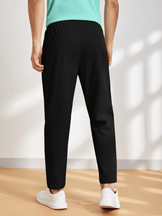 Manfinity Basics Men Solid Drawstring Waist Pants - Lolli World Marketplace