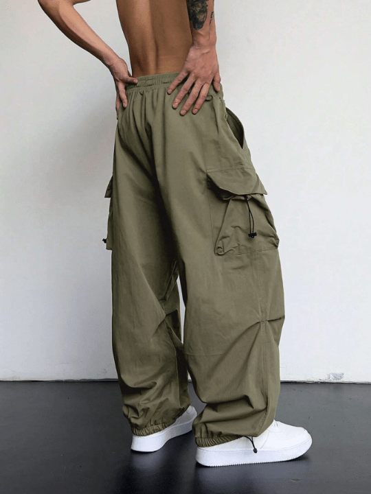 Manfinity EMRG Men Flap Pocket Side Drawstring Waist Oversize Cargo Pants - Lolli World Marketplace