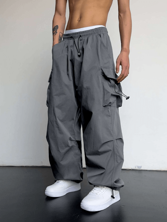 Manfinity EMRG Men Solid Flap Pocket Drawstring Waist Oversized Cargo Pants - Lolli World Marketplace
