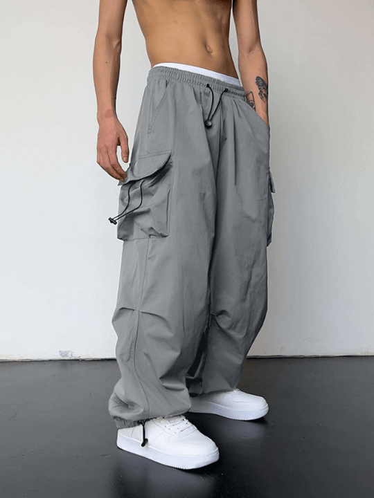 Manfinity EMRG Men Solid Flap Pocket Drawstring Waist Oversized Cargo Pants - Lolli World Marketplace