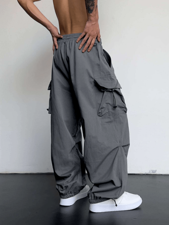 Manfinity EMRG Men Solid Flap Pocket Drawstring Waist Oversized Cargo Pants - Lolli World Marketplace