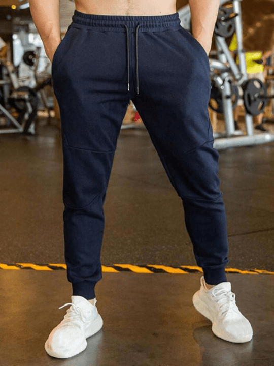Manfinity Homme Men Solid Drawstring Waist Sweatpants - Lolli World Marketplace