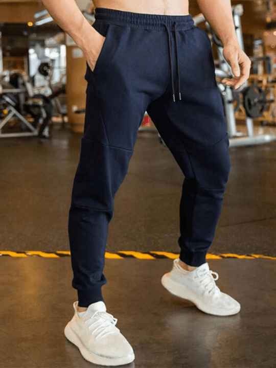 Manfinity Homme Men Solid Drawstring Waist Sweatpants - Lolli World Marketplace