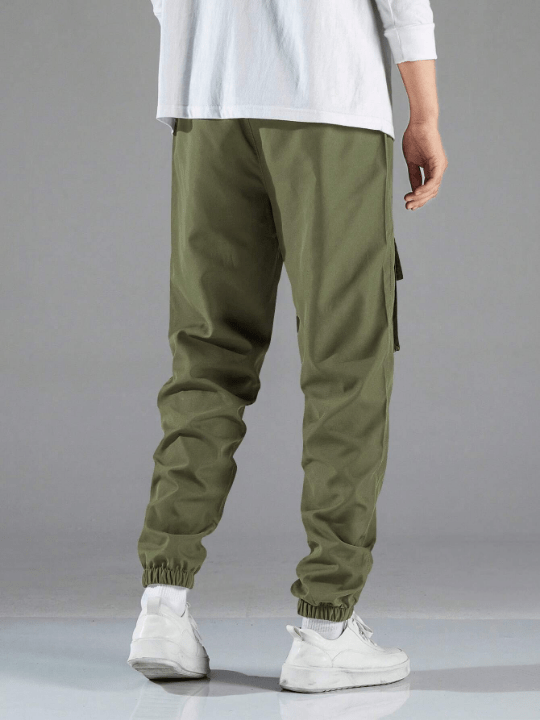 Manfinity Hypemode Men Letter Graphic Flap Pocket Drawstring Waist Cargo Pants - Lolli World Marketplace