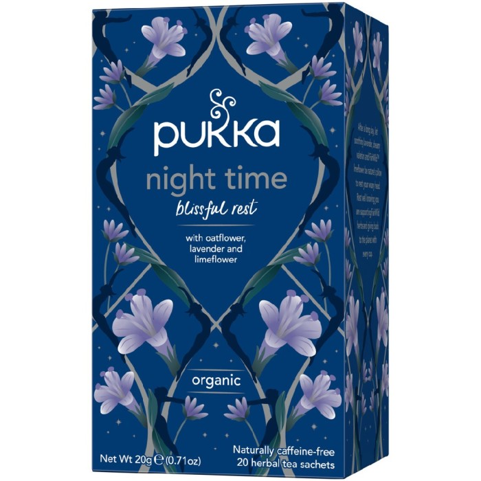 Box of Pukka Night Time Blissful Rest tea with caffeine-free herbal tea bags, featuring lavender and limeflower, displayed against a dark background with a floral pattern.
