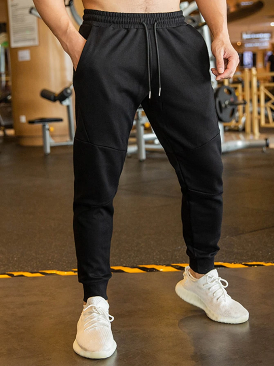 Manfinity Homme Men Drawstring Waist Solid Sweatpants