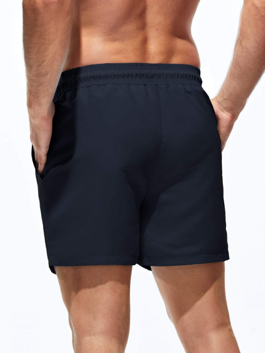 Manfinity Swimmode Men Solid Swim Trunks