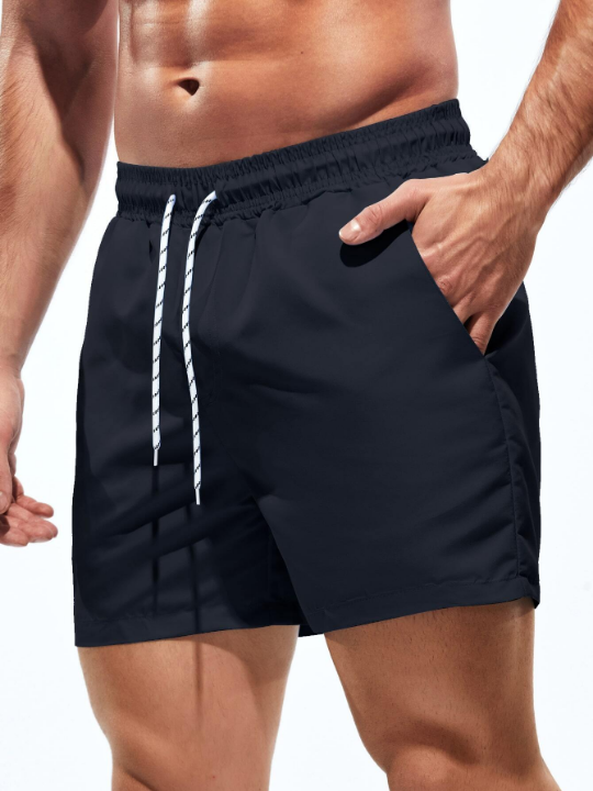 Manfinity Swimmode Men Solid Swim Trunks