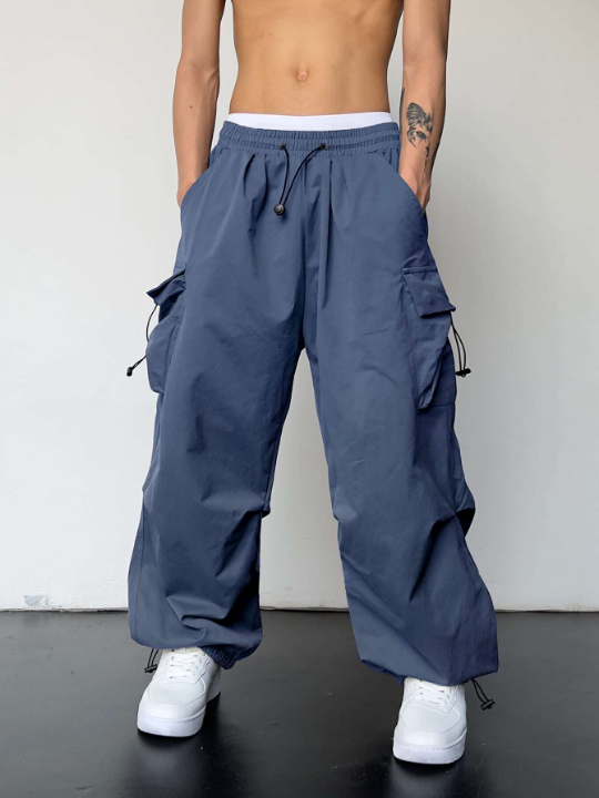 Manfinity EMRG Men Solid Flap Pocket Drawstring Waist Oversized Cargo Pants