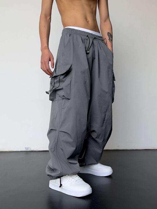 Manfinity EMRG Men Solid Flap Pocket Drawstring Waist Oversized Cargo Pants