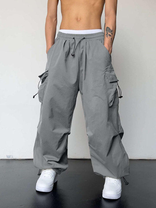 Manfinity EMRG Men Solid Flap Pocket Drawstring Waist Oversized Cargo Pants