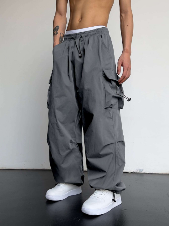 Manfinity EMRG Men Solid Flap Pocket Drawstring Waist Oversized Cargo Pants