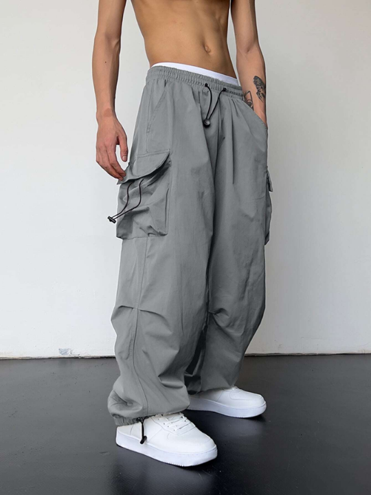 Manfinity EMRG Men Solid Flap Pocket Drawstring Waist Oversized Cargo Pants