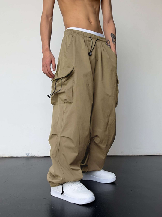 Manfinity EMRG Men Solid Flap Pocket Drawstring Waist Loose Cargo Pants