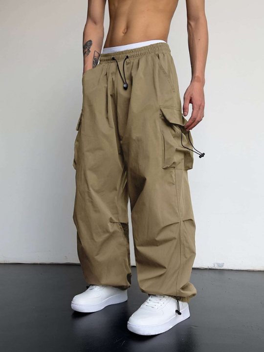 Manfinity EMRG Men Solid Flap Pocket Drawstring Waist Loose Cargo Pants