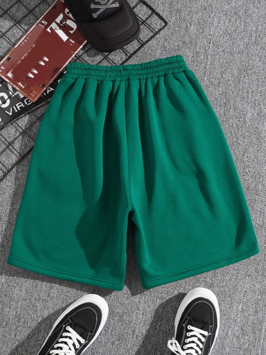 Men Drawstring Waist Slant Pocket Shorts