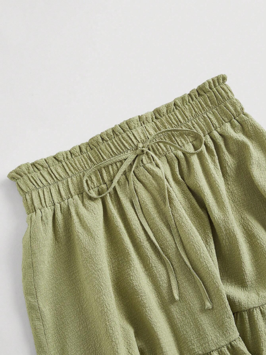 MOD Solid Knot Front Ruffle Hem Skirt