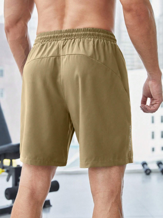 Sport Corelite Men Letter Graphic Zip Pocket Drawstring Waist Sports Shorts