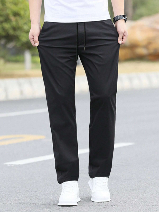 Manfinity Homme Loose Fit Men's Solid Color Straight Leg Pants