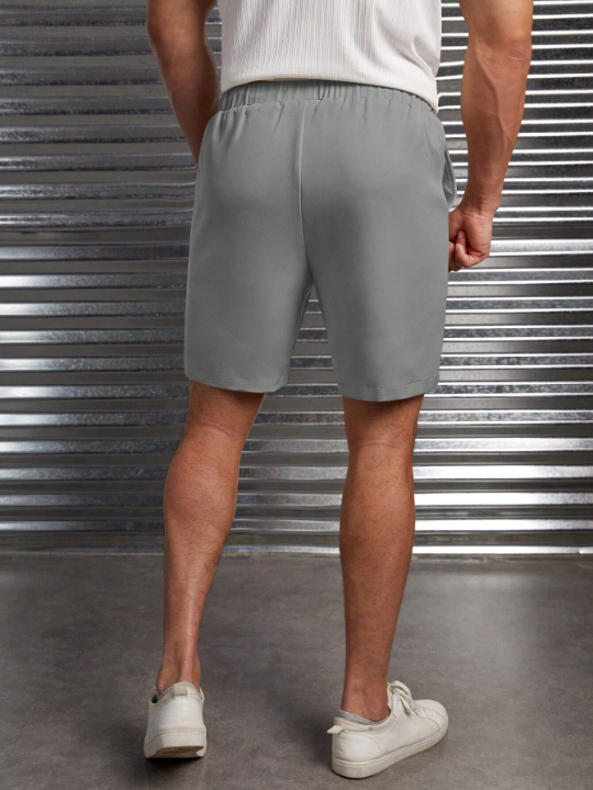 Manfinity Homme Men Solid Drawstring Waist Shorts