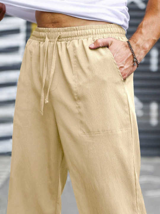 Manfinity Homme Loose Fit Men's Solid Color Drawstring Waist Pants