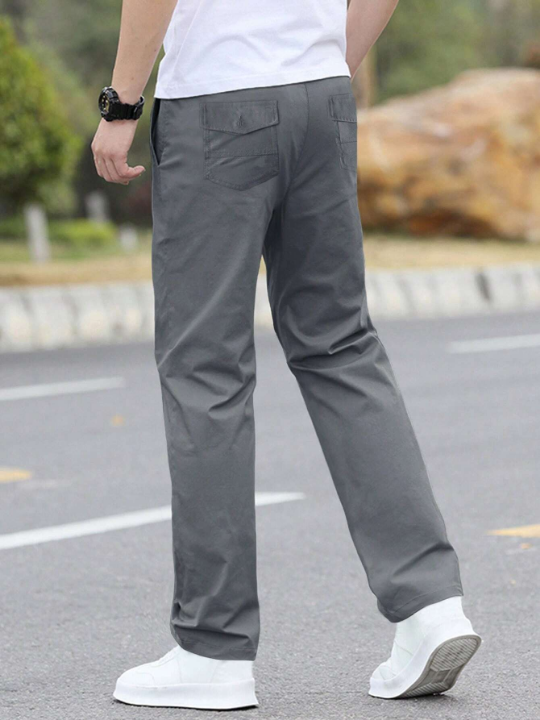 Manfinity Homme Loose Fitting Solid Straight Leg Men's Pants