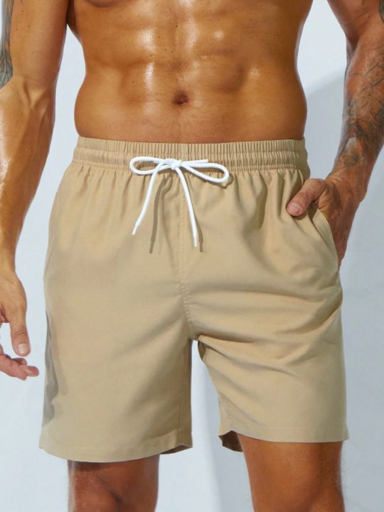 Manfinity Swimmode Men Drawstring Waist Slant Pocket Solid Swim Trunks