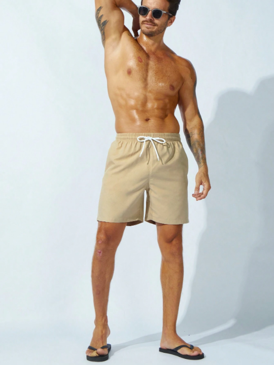 Manfinity Swimmode Men Drawstring Waist Slant Pocket Solid Swim Trunks