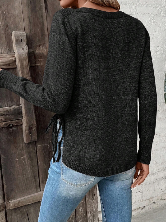 Clasi Solid Curved Hem Sweater