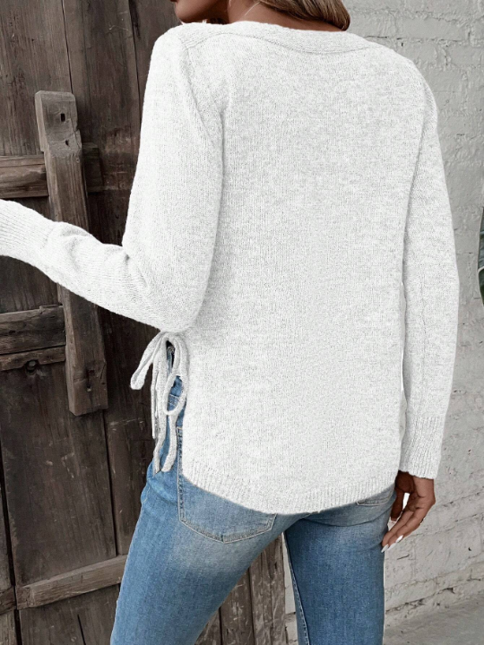 Clasi Solid Curved Hem Sweater