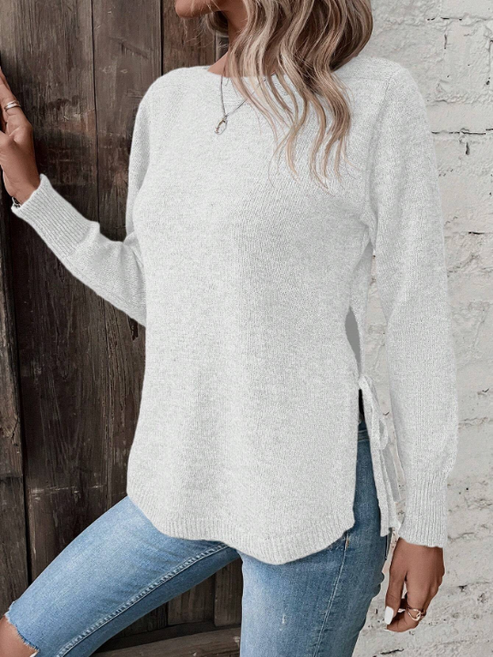 Clasi Solid Curved Hem Sweater