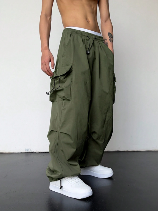 Manfinity EMRG Men Solid Flap Pocket Drawstring Waist Oversized Cargo Pants