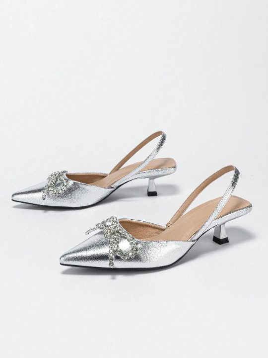 Women's Silver High Heel Pumps With Rhinestone Bowknot Decoration, Pointed Toe, Cut-outs And Ankle Straps For Fashionable Party Look