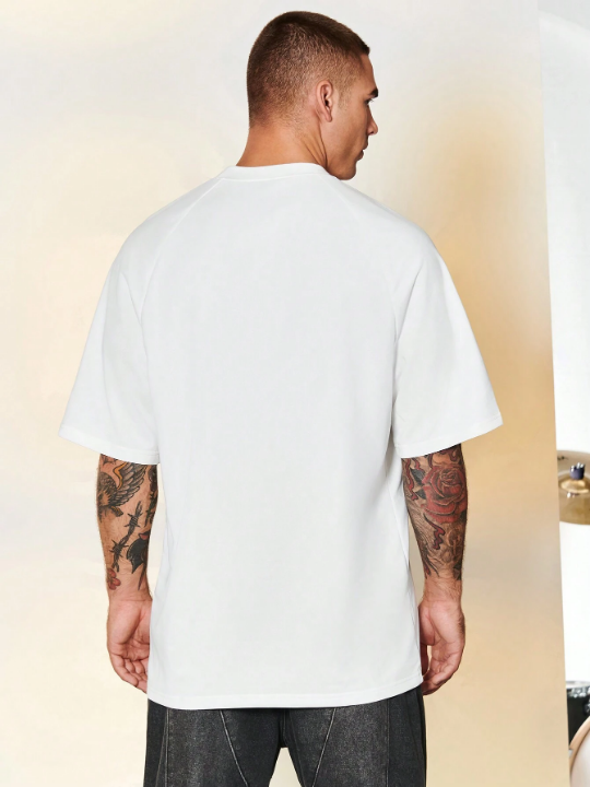 Manfinity LEGND Men Solid Raglan Sleeve Tee