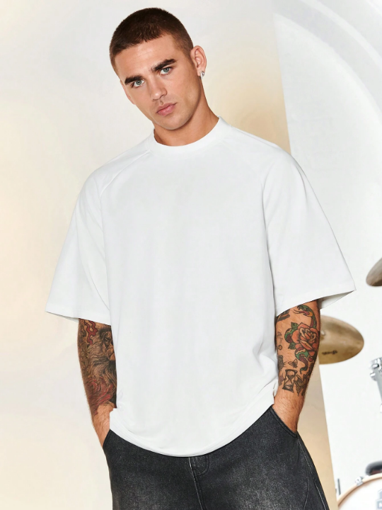 Manfinity LEGND Men Solid Raglan Sleeve Tee