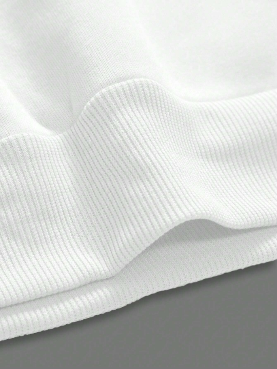 Manfinity EMRG Men's Loose Fit Hoodie With Slogan Graphic Design And Drawstring