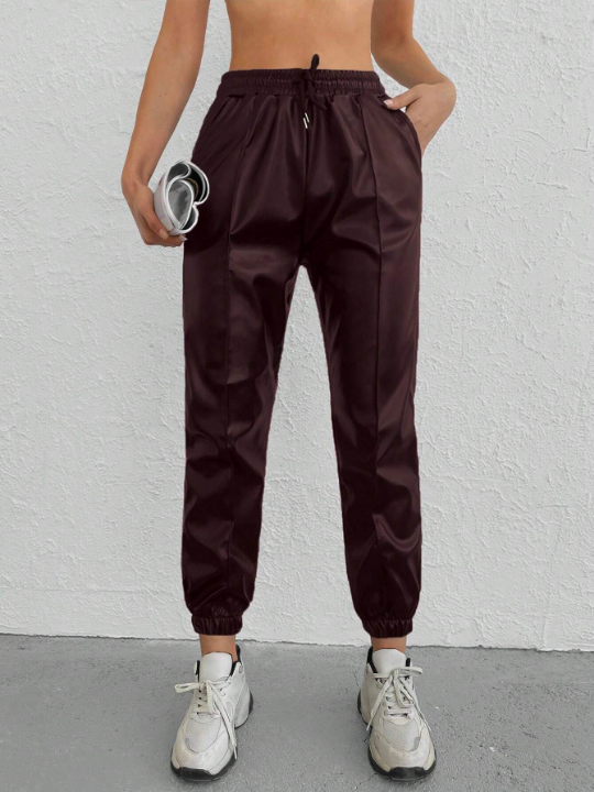 Drawstring Waist Solid Color Tapered Pants