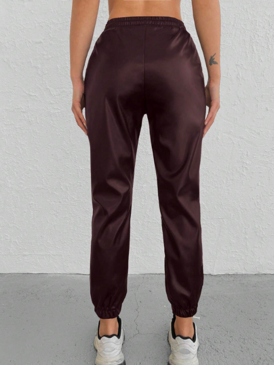 Drawstring Waist Solid Color Tapered Pants