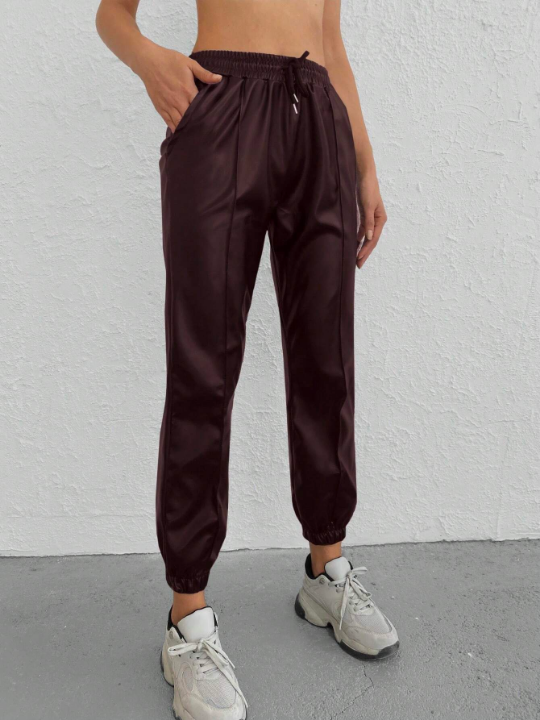 Drawstring Waist Solid Color Tapered Pants