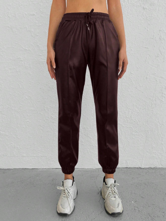 Drawstring Waist Solid Color Tapered Pants