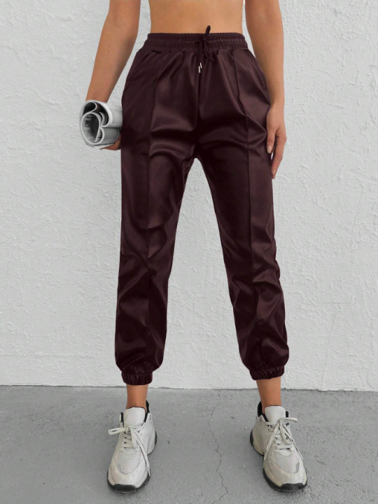 Drawstring Waist Solid Color Tapered Pants