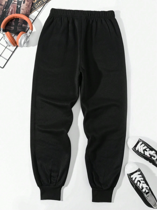 Men's Drawstring Elastic Waist And Cuffed Pants