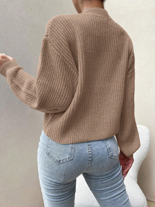 Essnce Knitted Sweater With Half High Collar And Drop Shoulder Design