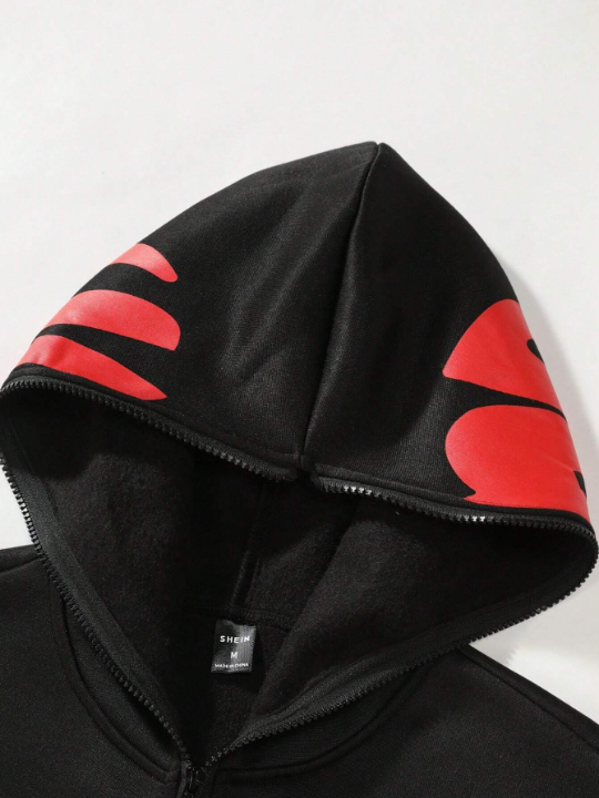 Manfinity EMRG Men's Loose Fit Hooded Sweatshirt With Text Graphic And Fleece Lining