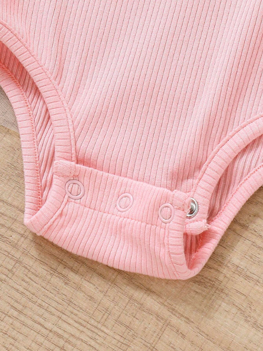 Baby Girl Pink Knitted Bodysuit With Heart Detail & Mesh Panel At Bottom