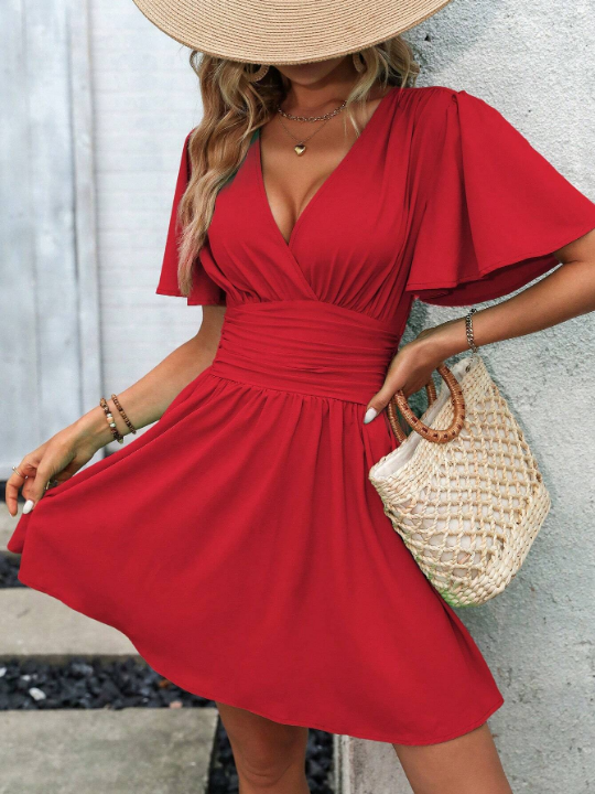 LUNE Wrap Neckline Flared Sleeve Dress