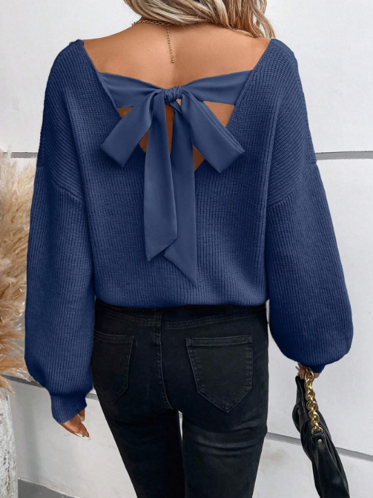 Frenchy Solid Color Knitted Sweater With Back Knot And Drop Shoulder Design